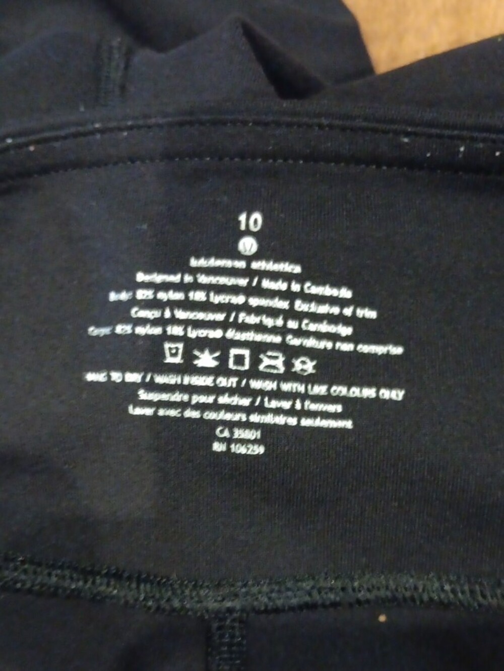 lululemon athletica Black Capri Leggings with Pink and White Side Stripe - Picture 3 of 4